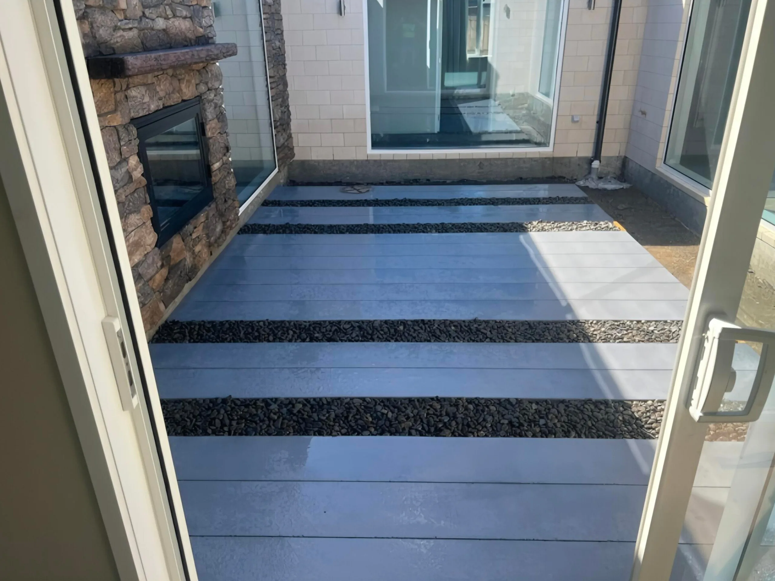 Poured concrete patio with saw-cut geometric pattern in Christchurch